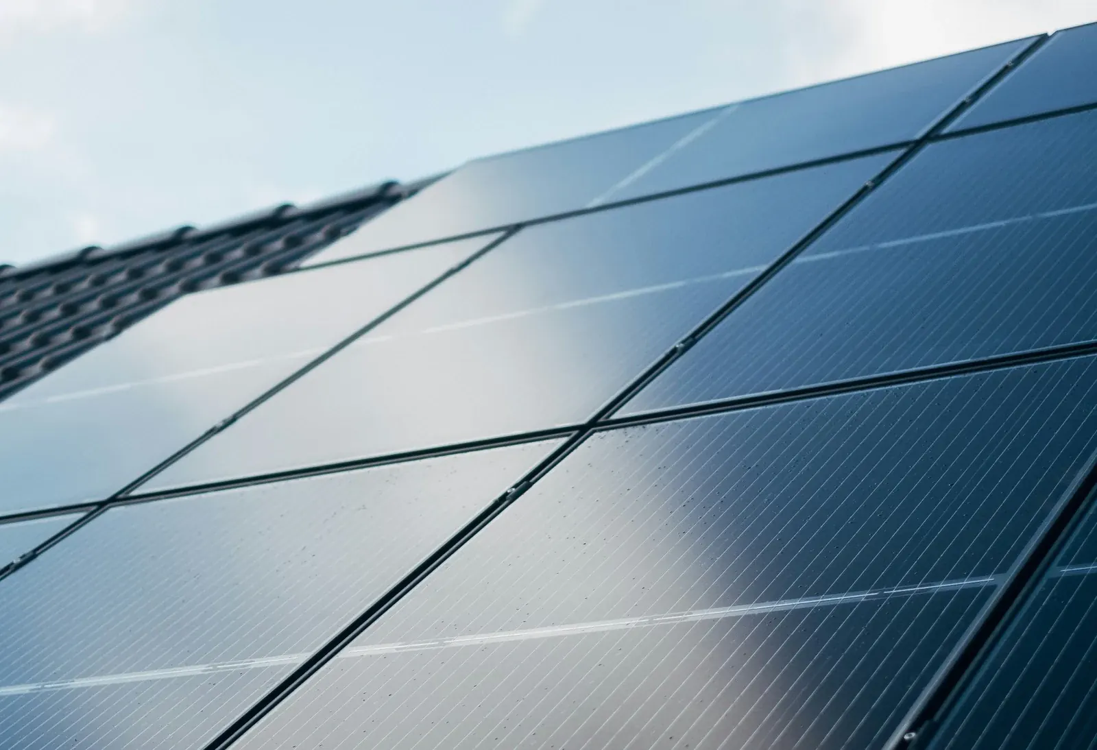Clean solar panels reflecting daylight after cleaning